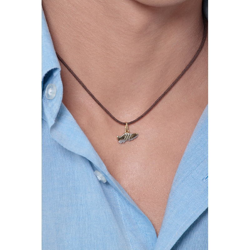 Football shoe pendant in 18k yellow and white gold Football shoe pendant in 18k yellow and white gold