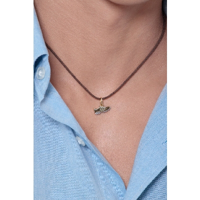 Football shoe pendant in 18k yellow and white gold