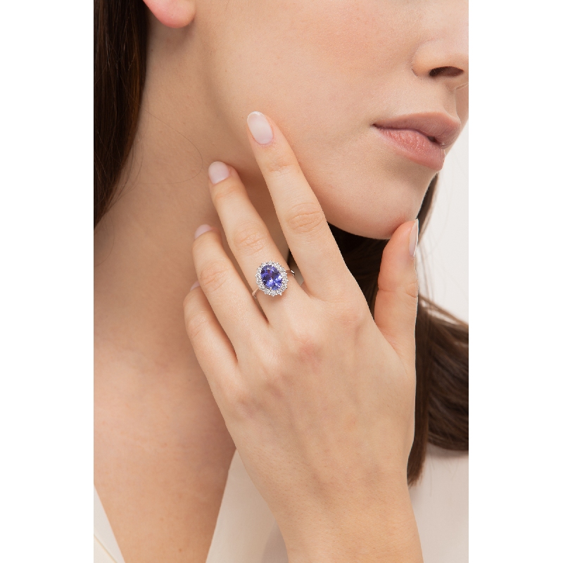 Tanzanite and diamond halo ring 18kt white gold