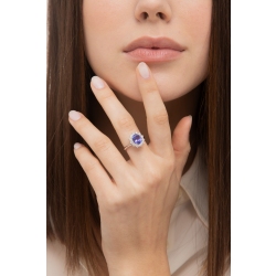 Ring in white gold 18k with central oval tanzanite and halo in diamonds 2