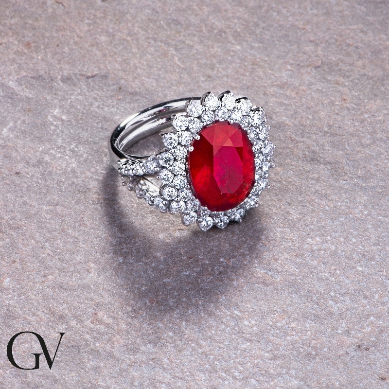 White gold 18k halo ring with diamonds and ruby White gold 18k halo ring with diamonds and ruby