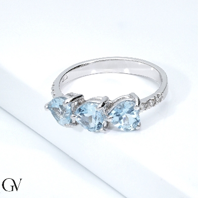 White gold 18k ring with three aquamarines heart cut and diamonds shoulder set 