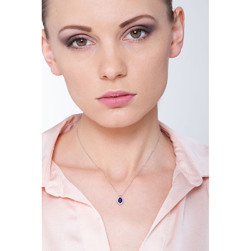 Necklace with oval cut blue sapphire and diamonds Necklace with oval cut blue sapphire and diamonds