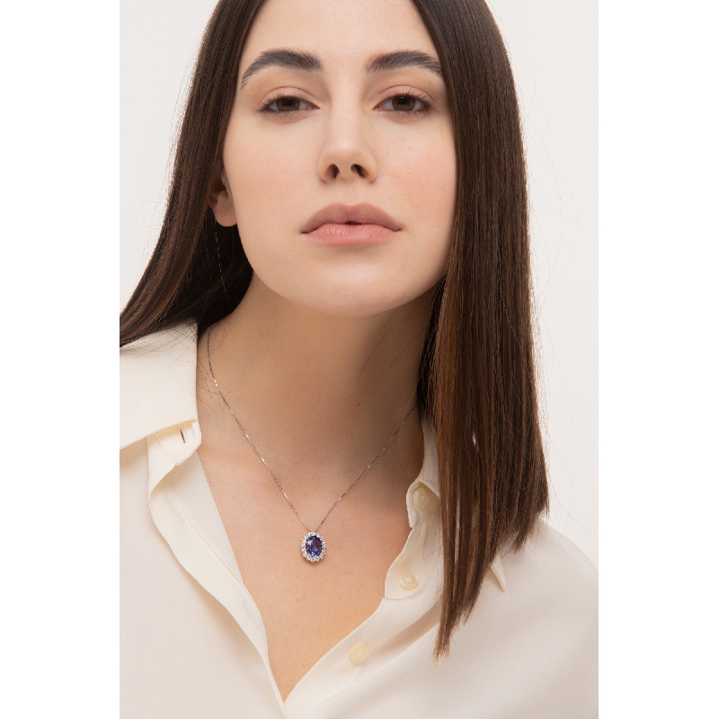 18k white gold necklace with halo pendant with tanzanite and diamonds 18k white gold necklace with halo pendant with tanzanite and diamonds