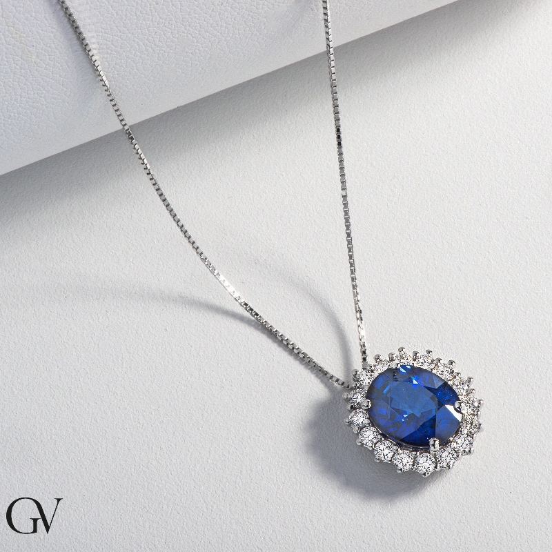 Necklace in white gold 18k with blue sapphire oval cut and diamonds  Necklace in white gold 18k with blue sapphire oval cut and diamonds