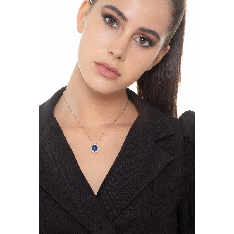Necklace in white gold 18k with blue sapphire oval cut and diamonds  Necklace in white gold 18k with blue sapphire oval cut and diamonds