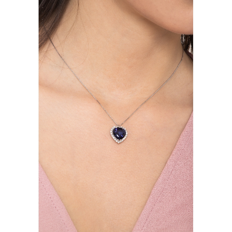 Halo necklace with sapphire and diamond pendant