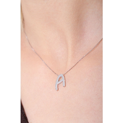 Gold necklace with letter A with diamond