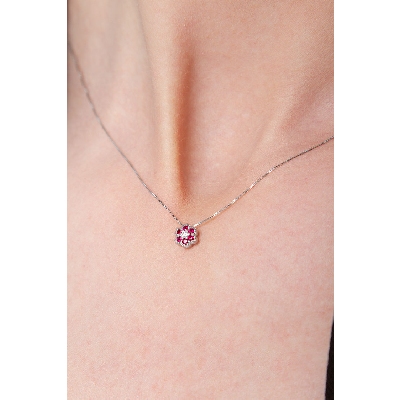 Little flower pendant in 18k white gold with rubies and diamonds