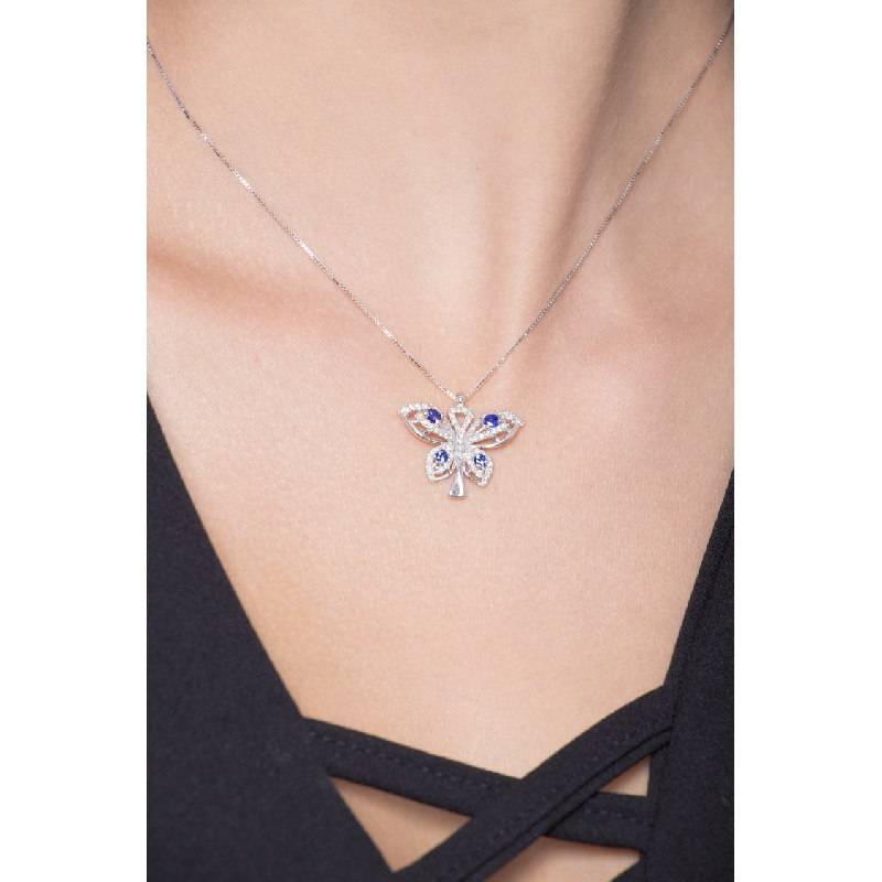 Fancy butterfly pendant in 18k white gold with sapphires and diamonds