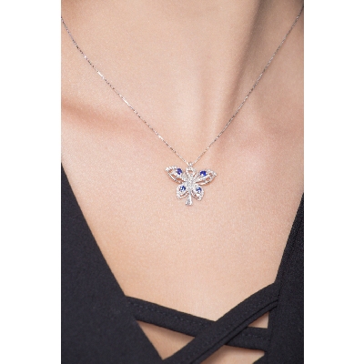 Fancy butterfly pendant in 18k white gold with sapphires and diamonds
