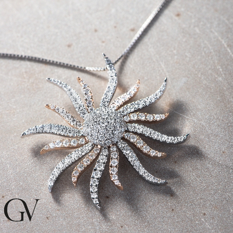 18k rose and white gold sun pendant with diamonds