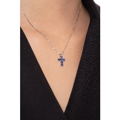 Cross pendant with blue sapphires 