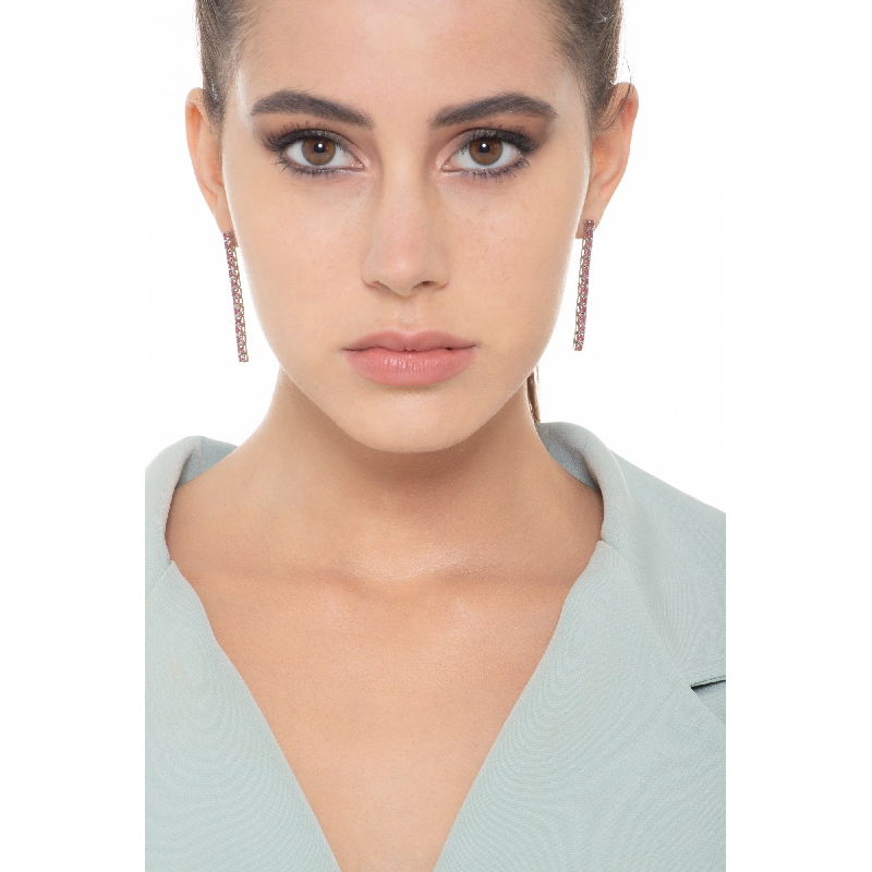 Drop tennis earrings with rubies in 18k white gold