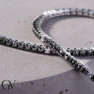 Wire tennis bracelet with black and white round cut diamonds