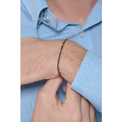 18k white gold tennis bracelet with black diamonds and burnished tips