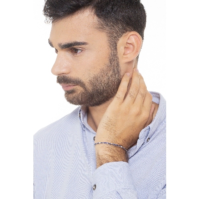 750 white gold tennis bracelet with blue sapphires and diamonds