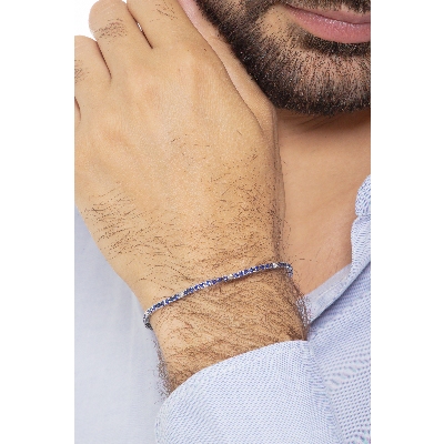 750 white gold tennis bracelet with blue sapphires and diamonds