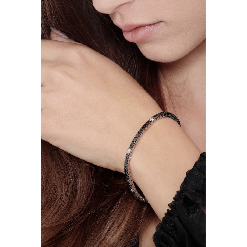 Tennis bracelet with black and white diamonds Tennis bracelet with black and white diamonds