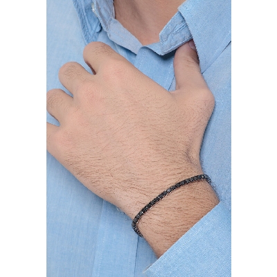 Tennis bracelet in white gold 18k wih burnished tips and black diamonds