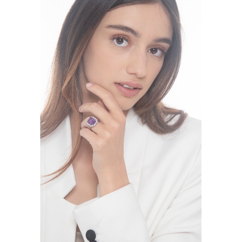 Emerald-cut amethyst diamond halo ring in 18kt white gold Emerald-cut amethyst diamond halo ring in 18kt white gold