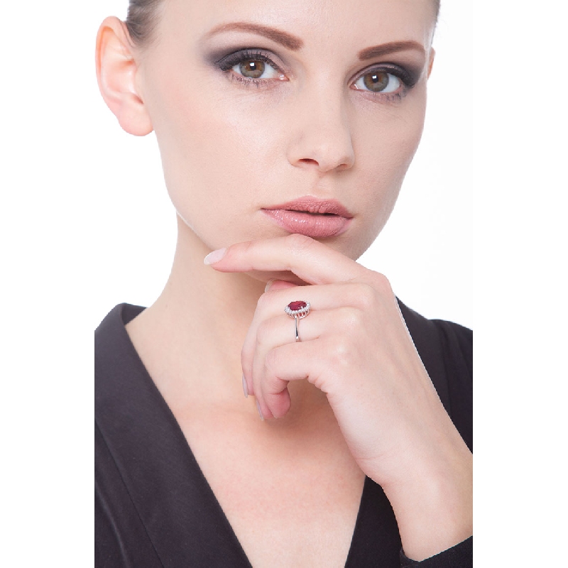 White gold 18k halo ring with diamonds and ruby White gold 18k halo ring with diamonds and ruby