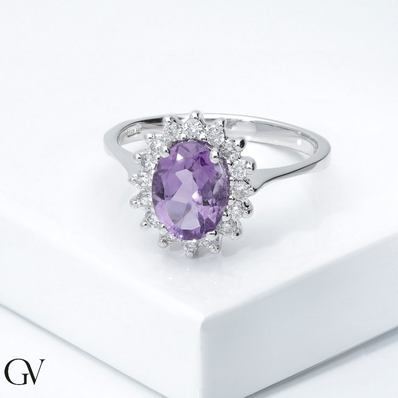 Halo ring 18k white gold with oval cut amethyst and diamonds Halo ring 18k white gold with oval cut amethyst and diamonds