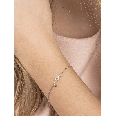 18k white gold bracelet with key charm in diamonds