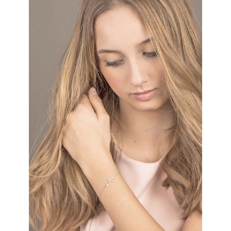 18k white gold bracelet with key charm in diamonds