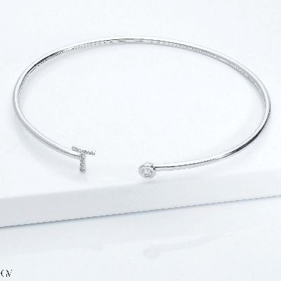 T initial bangle in white gold and diamonds