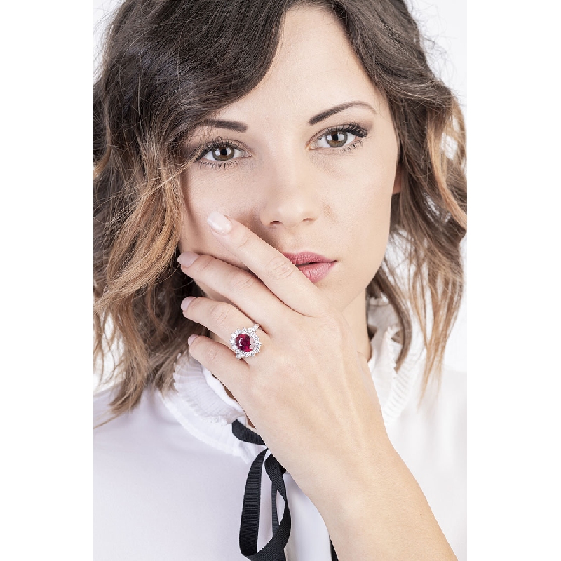 White gold 18k halo ring with ruby and diamonds  White gold 18k halo ring with ruby and diamonds