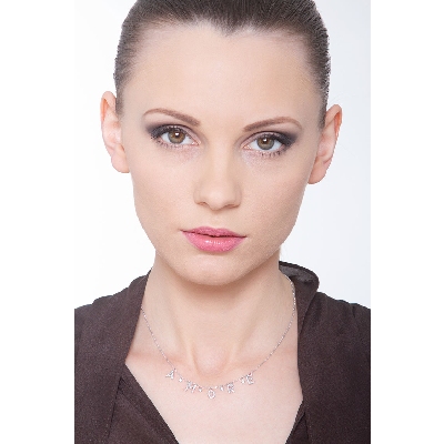 Necklace with letters AMORE in white gold and diamonds