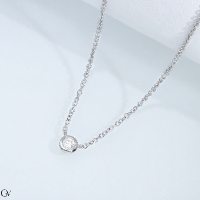 Necklace with diamond bezel setting in 18k white gold