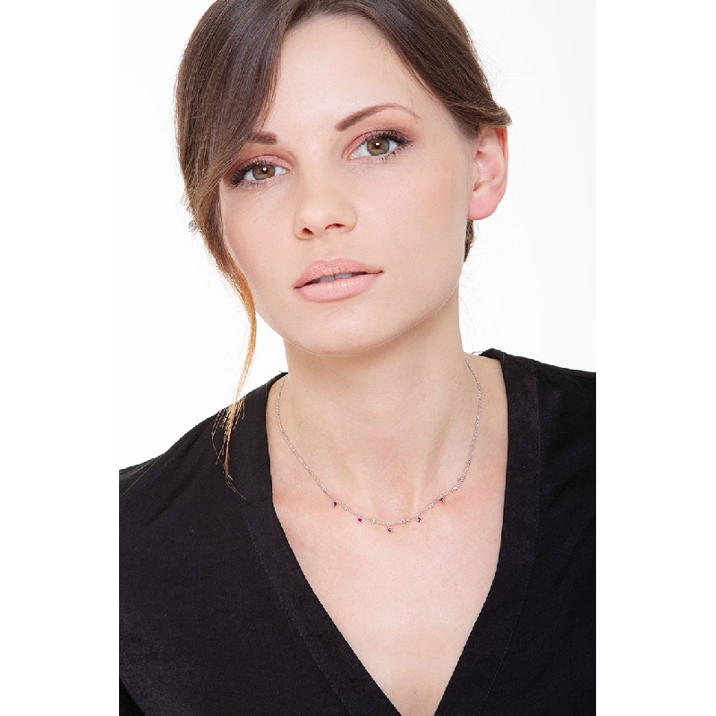 Necklace with diamonds and pear cut ruby charms