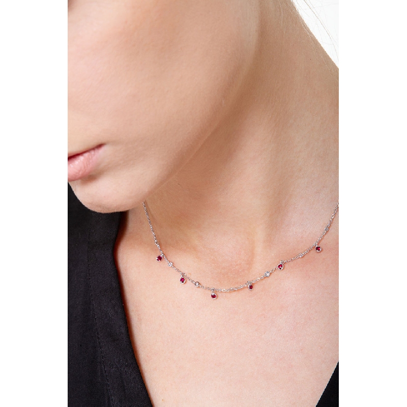 Necklace with diamonds and pear cut ruby charms