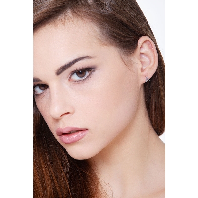 A letter earring in white gold and diamonds