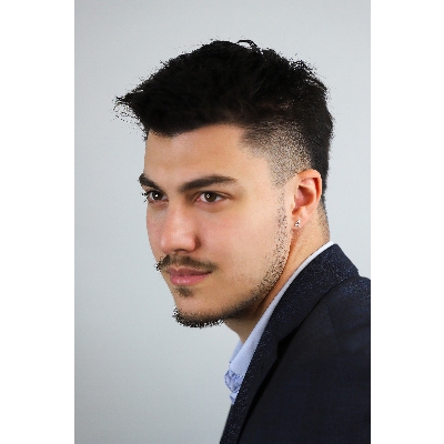 A letter earring in 18k white gold and diamonds