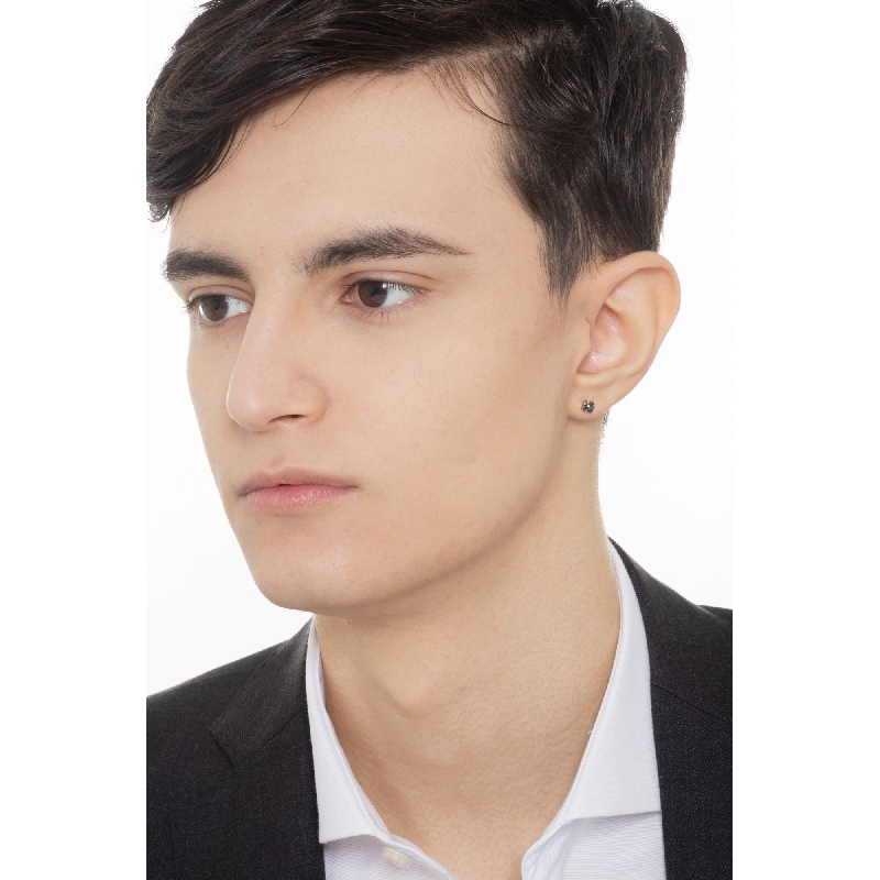 White gold 18k single stud earring with a black diamond White gold 18k single stud earring with a black diamond