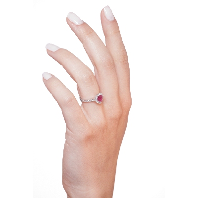 Halo ring with a ruby heart cut and diamonds shoulder set white gold 18k