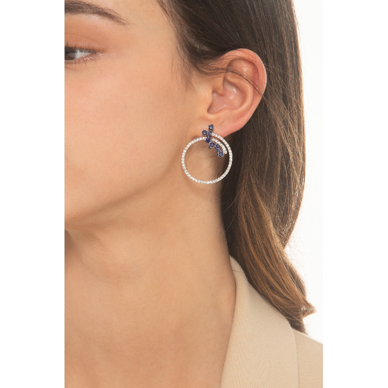 Hoop earrings in white gold 18k with blue sapphires and diamonds Hoop earrings in white gold 18k with blue sapphires and diamonds