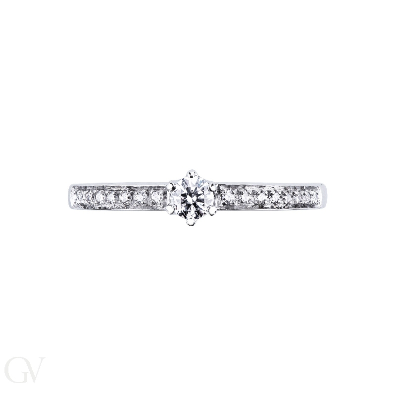 Solitaire ring in white gold 18k with diamonds, ct 0,10 Solitaire ring in white gold 18k with diamonds, ct 0,10