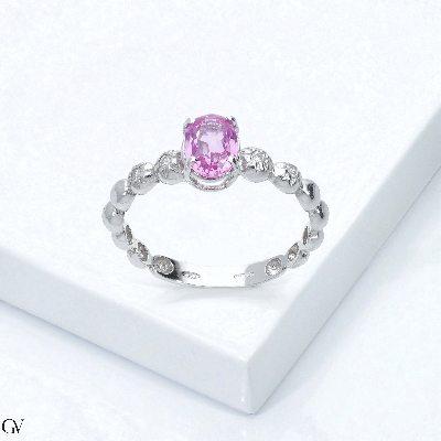 750 white gold ring with central pink sapphire and diamonds