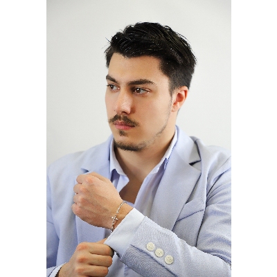 18k white gold spring bracelet with cross in diamonds 