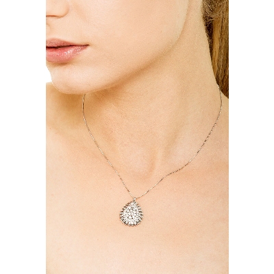 Fancy drop shape pendant with diamonds 