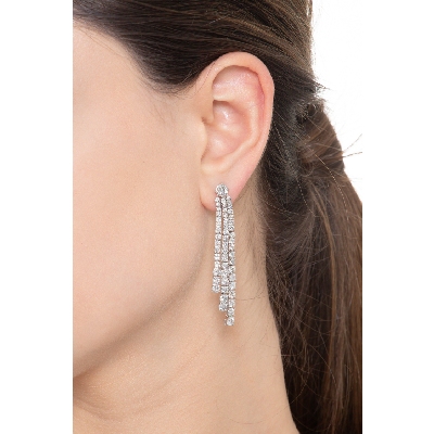 18k white gold triple drop tennis earrings with round cut diamonds