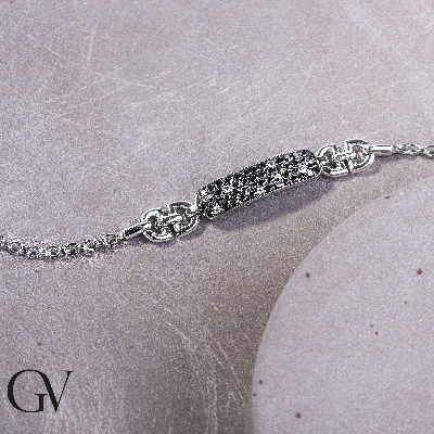 Fancy bracelet in 18k white gold with white and black diamonds