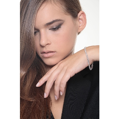 Tennis bracelet in white gold 18k with diamonds, about 3 mm wide