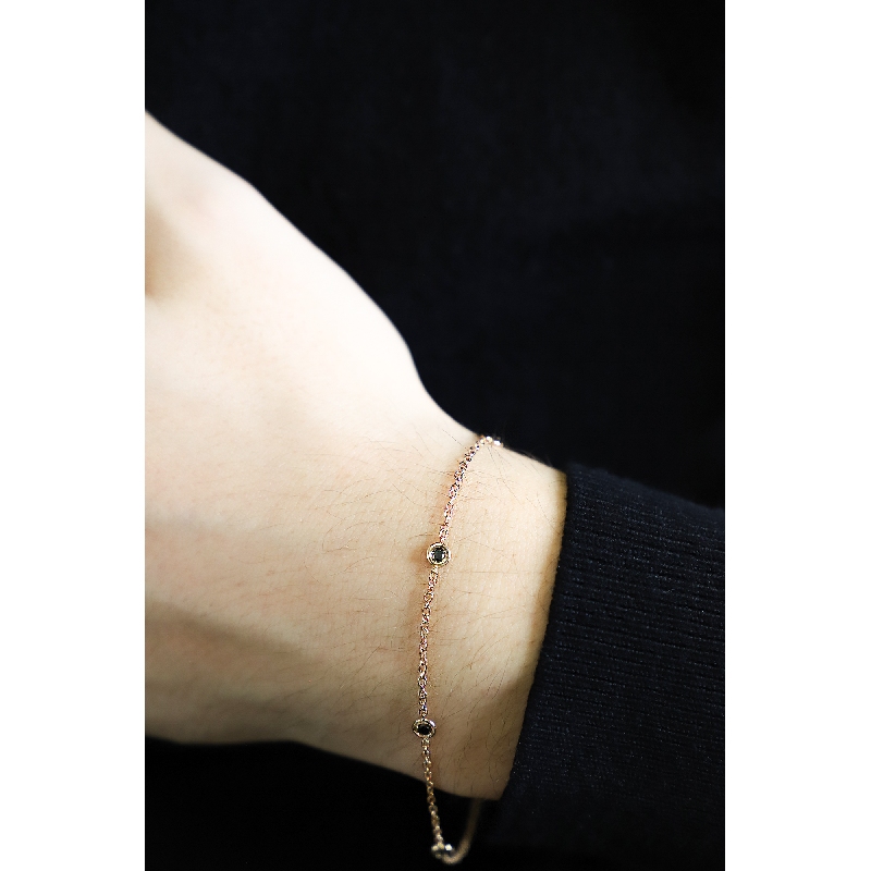 18k rose gold thin bracelet with 5 black round cut diamonds 18k rose gold thin bracelet with 5 black round cut diamonds