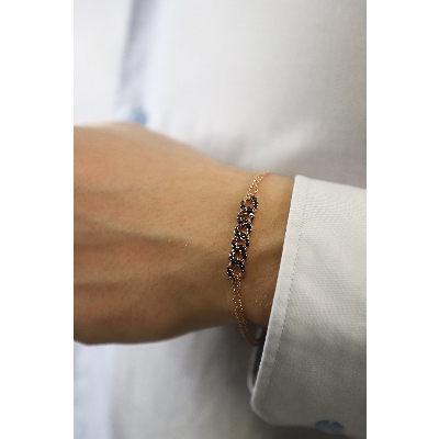 750 rose gold iced out with black diamonds