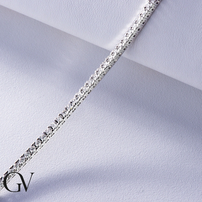 18k white gold tennis bracelet with diamonds about 2,40 mm wide 18k white gold tennis bracelet with diamonds about 2,40 mm wide